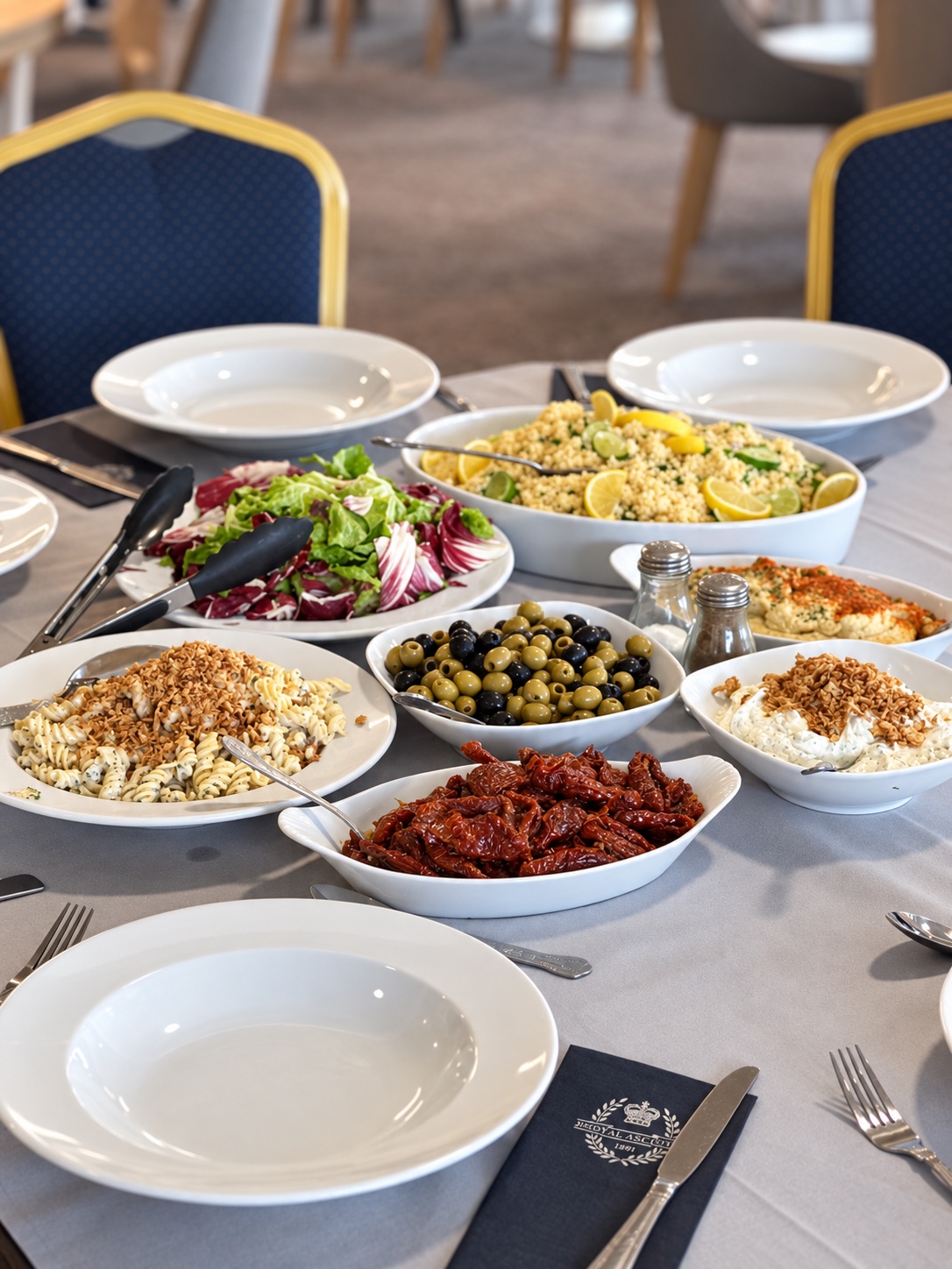 A colourful salad and antipasti buffet laid for guests